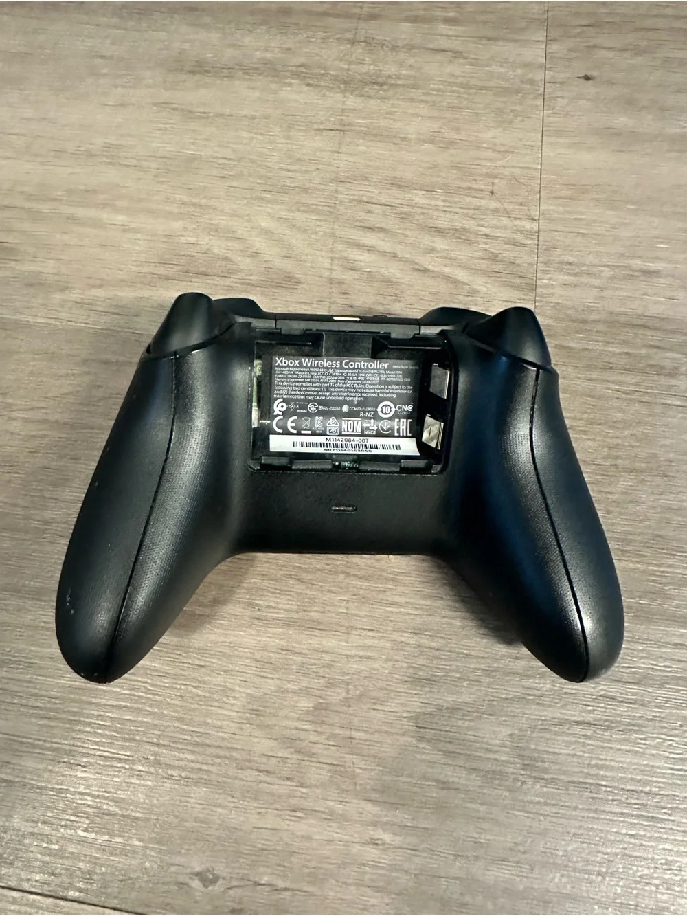 Sleek Black Wireless Gaming Controller with Color Buttons